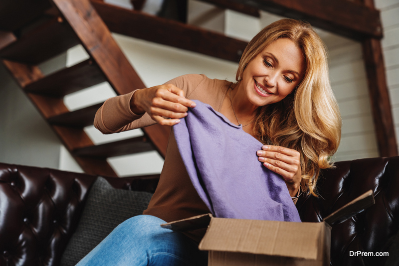 online shopping parcel received by the woman