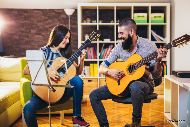 couple playing guitar