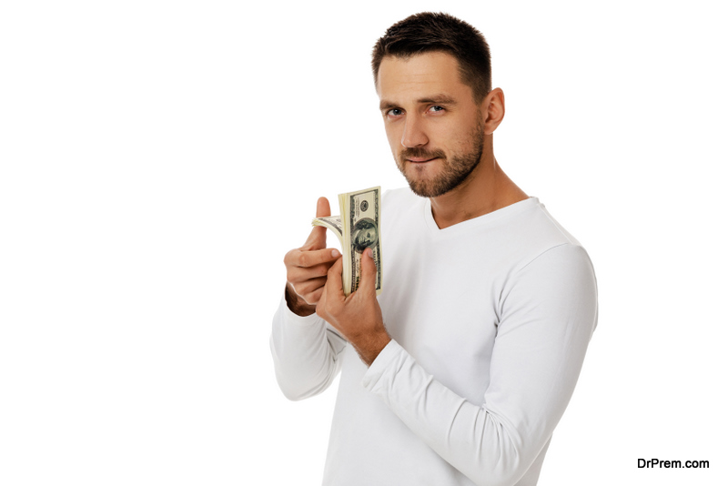 young man showing money