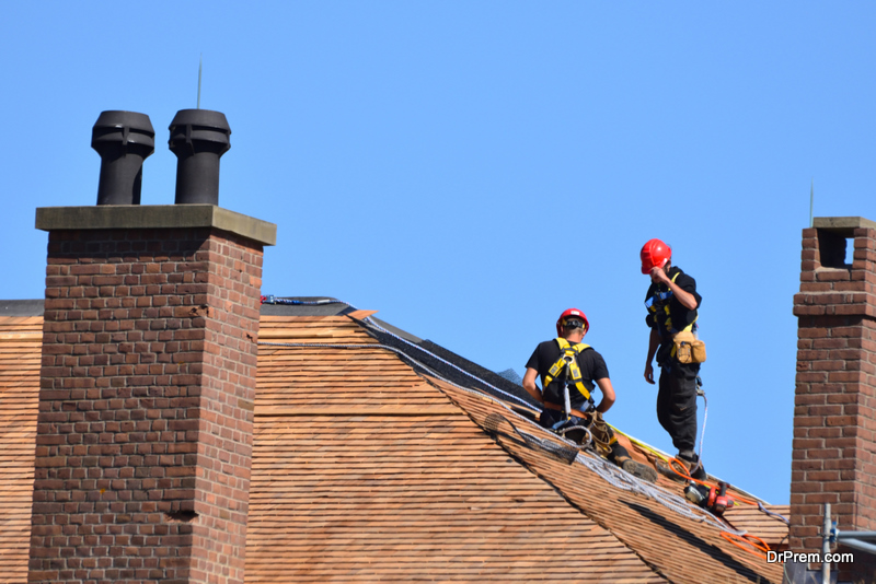 contractorTwo Men Repairing Roof 