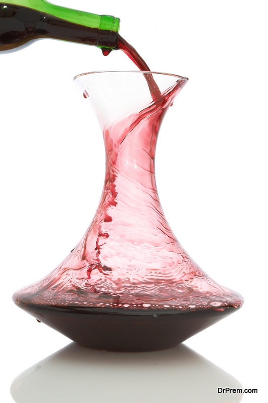 red wine into the carafe 