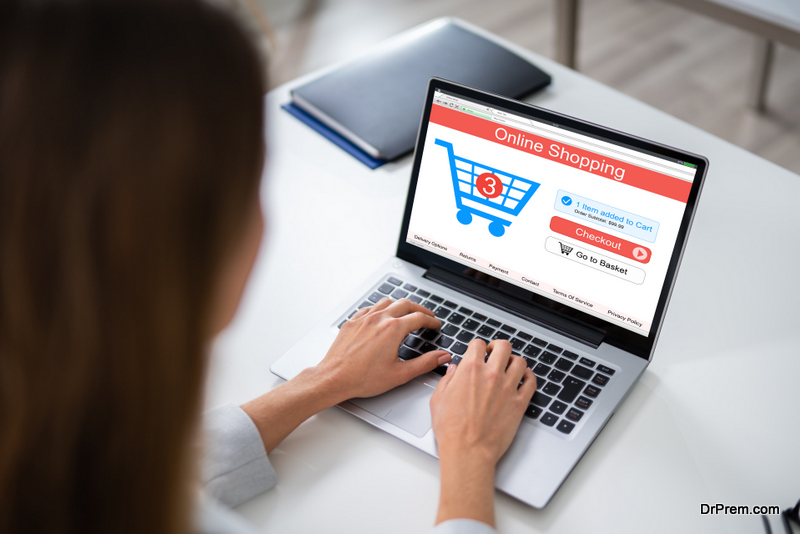 Close-up Of A Woman Doing Online Shopping On Laptop