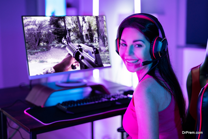 Online Player Woman With Computer Headset Playing Online Game